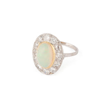 Charger l'image dans la galerie, Bague en opale ovale entourée de diamants