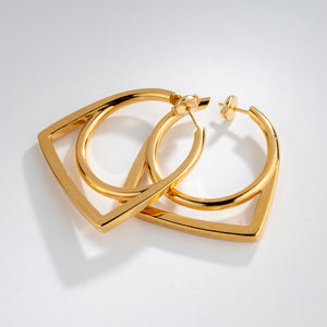 Boucles d'oreille en or jaune de la maison Fred, modèle Success