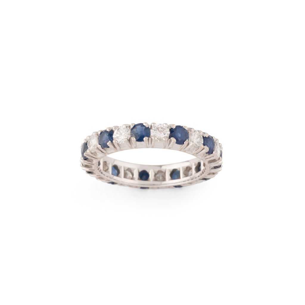 Alliance américaine en or gris,diamant et saphir .