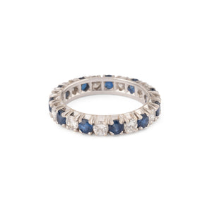 Alliance américaine en or gris,diamant et saphir .