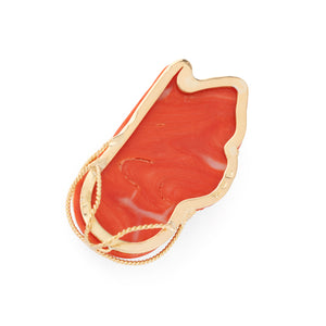 Pendentif en corail sur or jaune,représentant une tête de femme