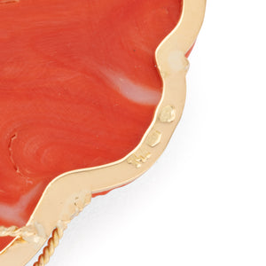 Pendentif en corail sur or jaune,représentant une tête de femme