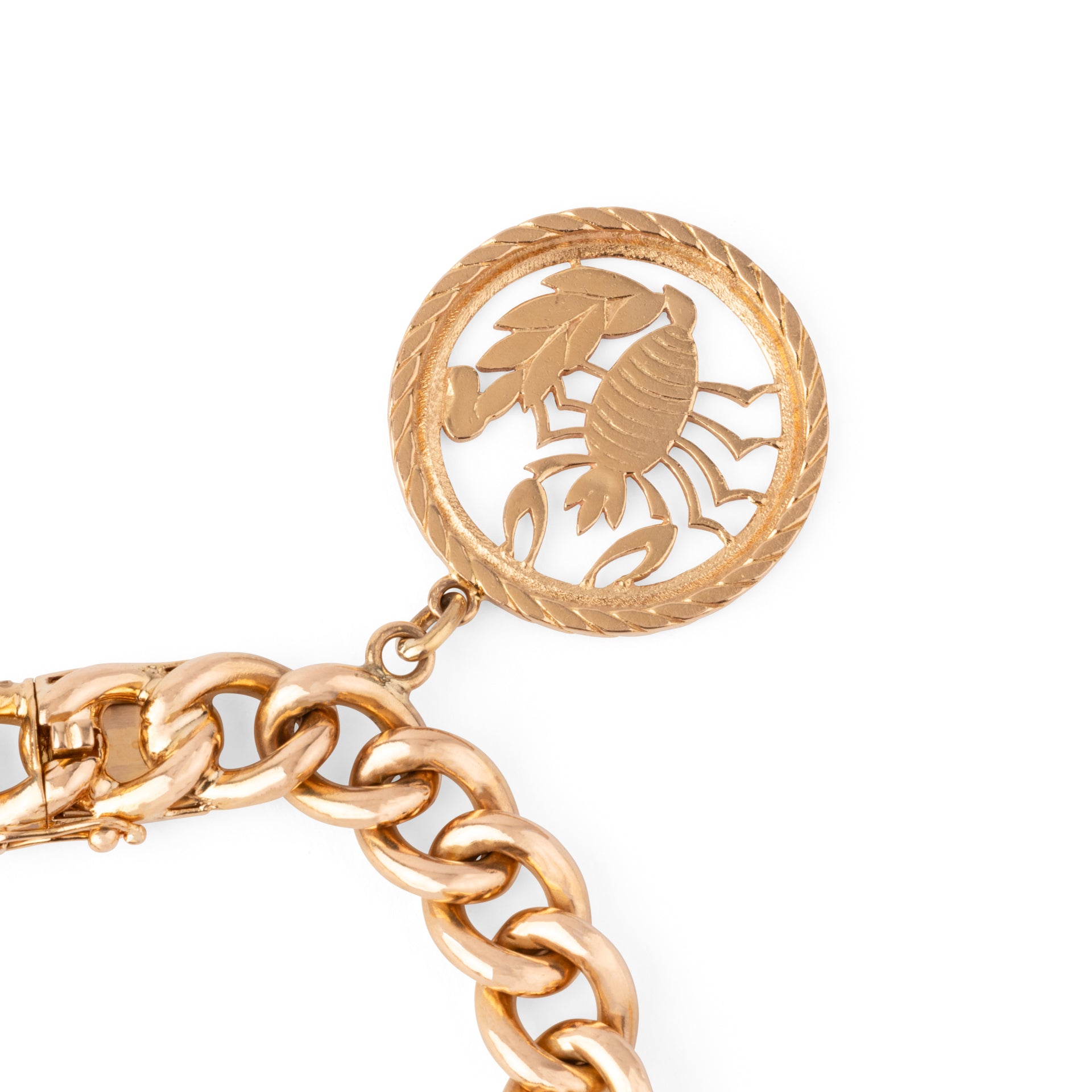 Bracelet or rose 18k,maillon gourmette orné de 4 breloques
