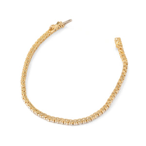 Bracelet riviere en diamant, sur or jaune en serti semi-clos