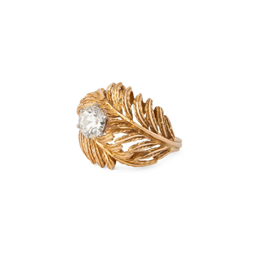 Bague en or jaune en forme de plume ornée d'un solitaire