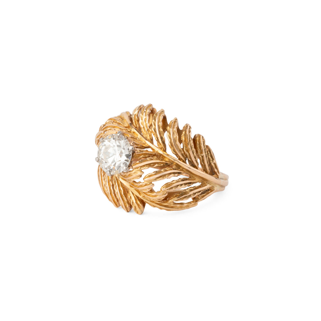 Bague en or jaune en forme de plume ornée d'un solitaire