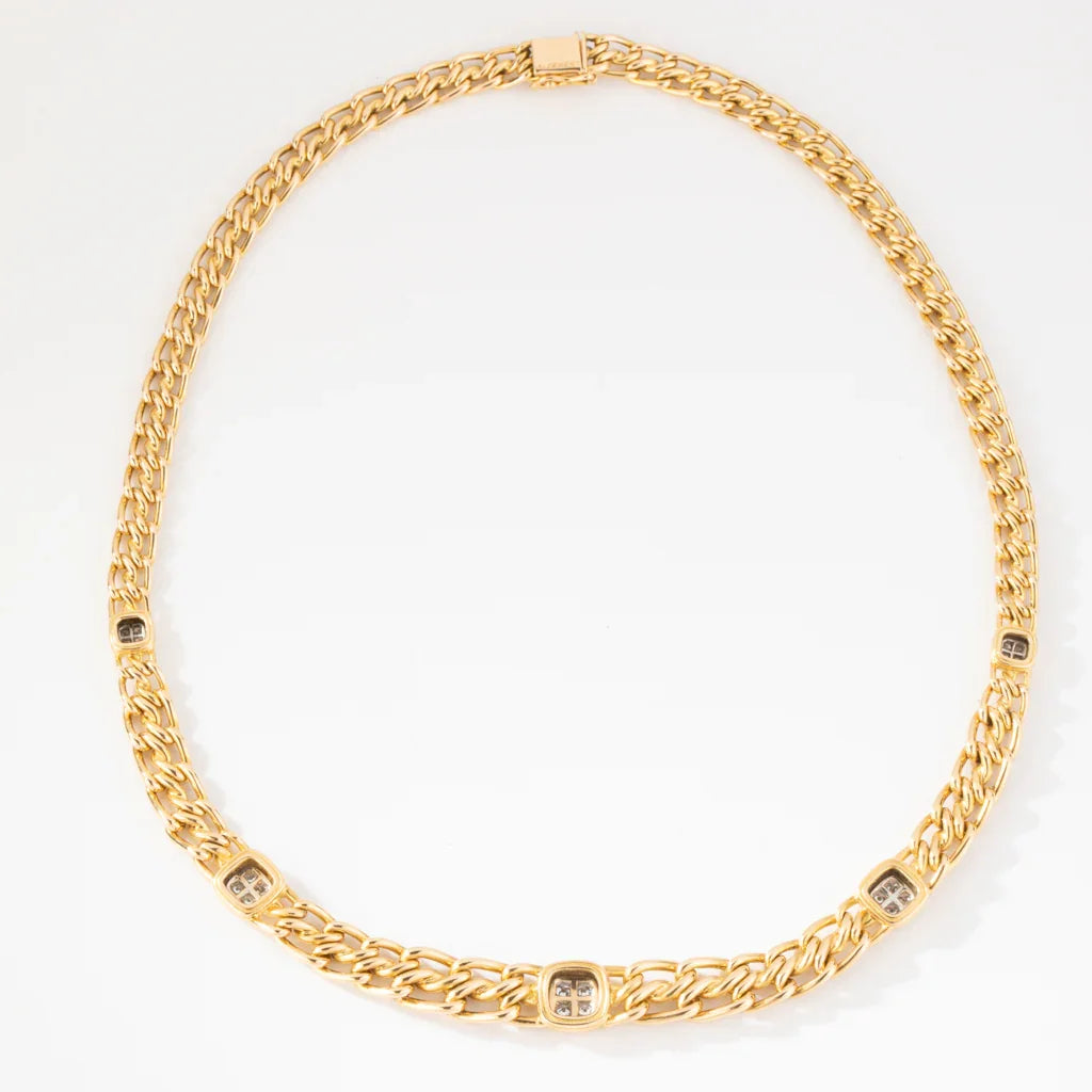 Collier or jaune maille gourmette intercalé de maillon en  diamant