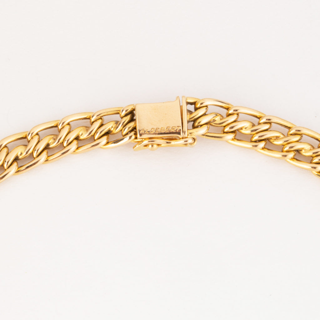 Collier or jaune maille gourmette intercalé de maillon en  diamant