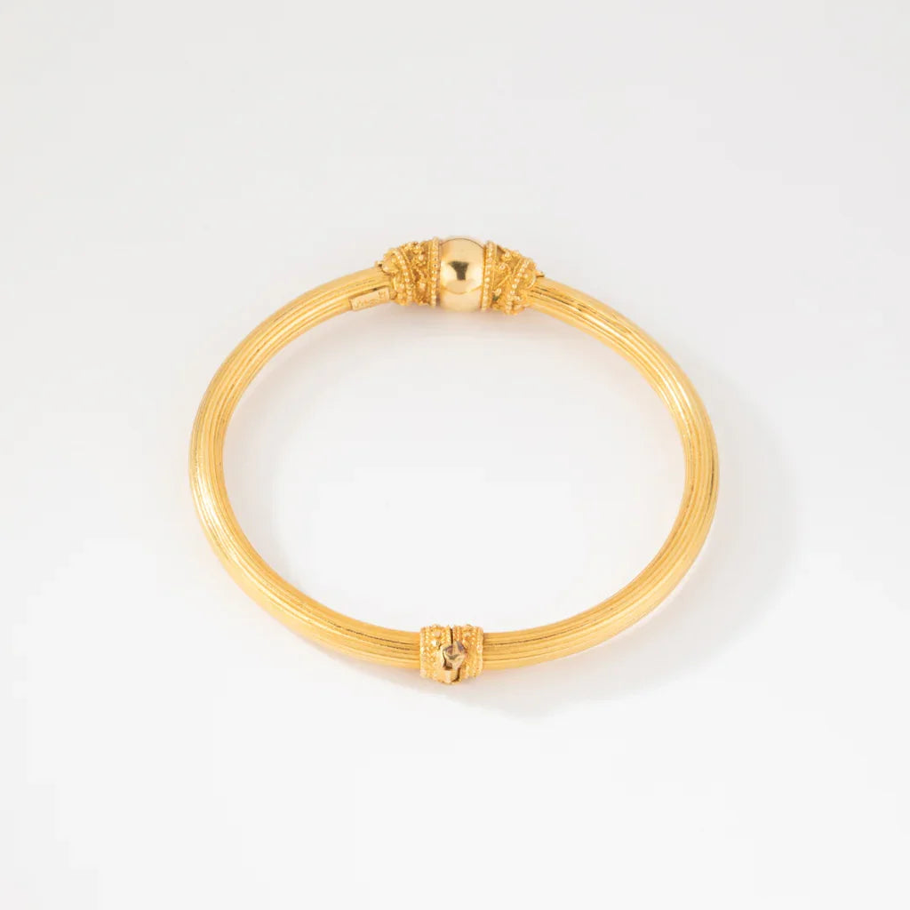 Bracelet jonc en or jaune 22k du créateur Lalaounis