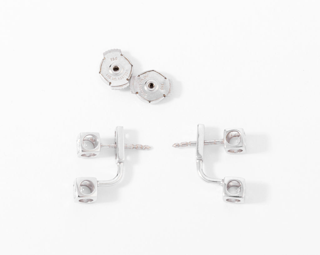 Boucles d'oreilles Dinh Van en or gris et diamants modèle Cube
