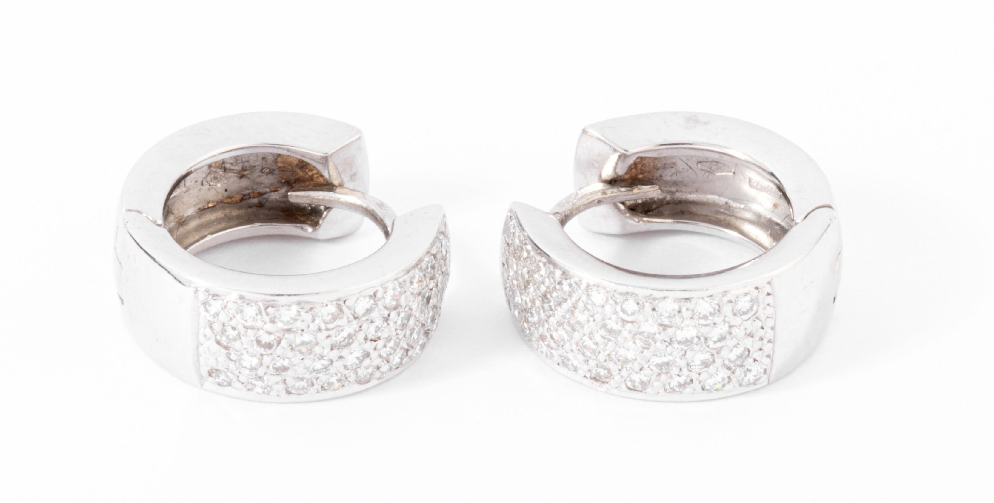 Boucles d'oreilles en demi créole en or gris et diamant
