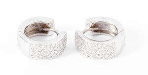 Boucles d'oreilles en demi créole en or gris et diamant
