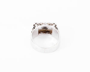 Bague chevaliere en platine ornée de 2 diamants