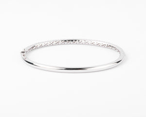 Bracelet jonc en or gris serti de 3 lignes de diamant