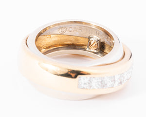 Bague jonc signée Cartier bi-colore en diamants princesses
