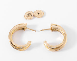 Boucles d'oreilles or jaune et diamant de la maison Cartier modèle Trinity