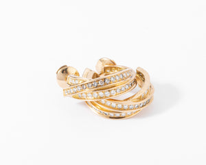 Boucles d'oreilles or jaune et diamant de la maison Cartier modèle Trinity