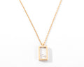 Collier or jaune et diamant sur plexisglass du créateur Pascal Morabito modèle cube