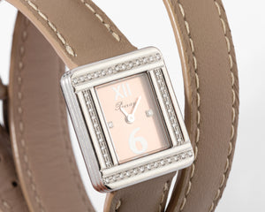 Montre en or gris et diamant Poiray modèle ma première mini
