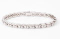 Bracelet riviere en diamant or gris et platine