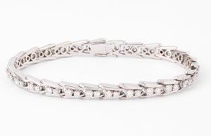 Bracelet riviere en diamant or gris et platine