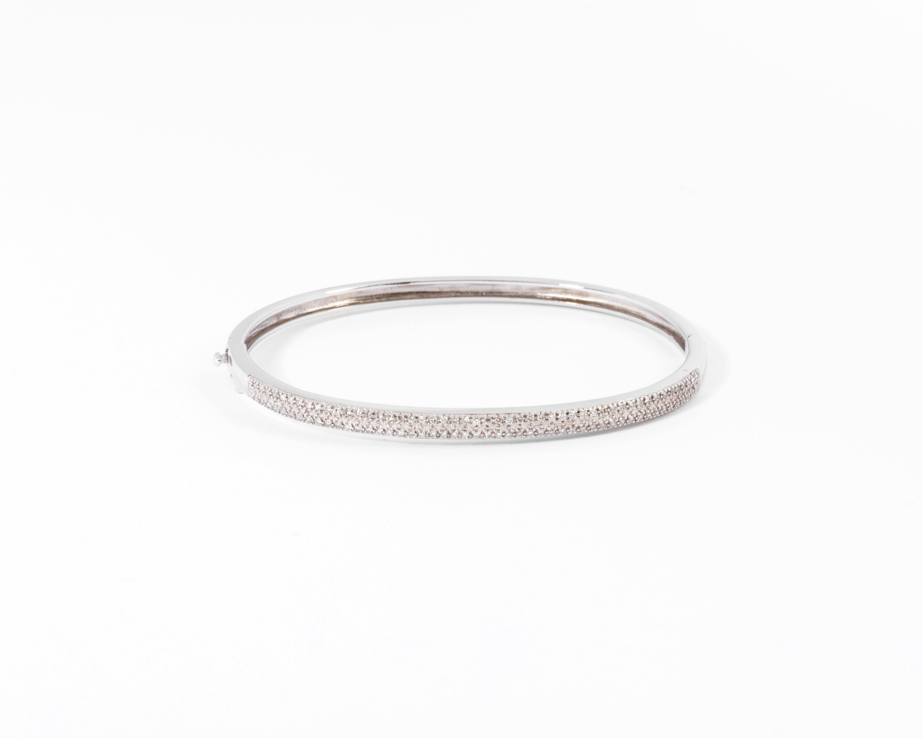 Bracelet  or gris rigide ouvrant en diamant