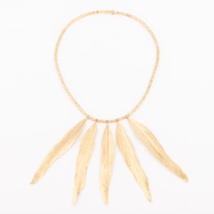 Collier en or H.Stern formant des plumes en or