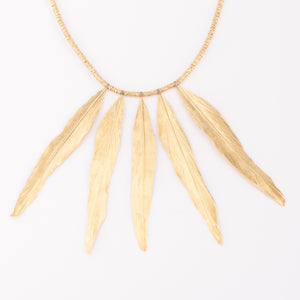 Collier en or H.Stern formant des plumes en or