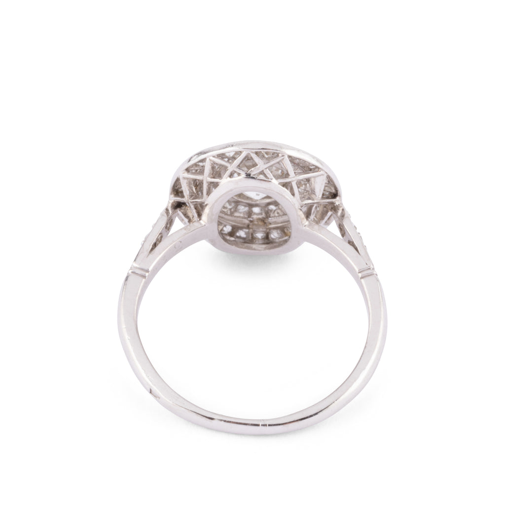 Bague double entourage en platine et diamants