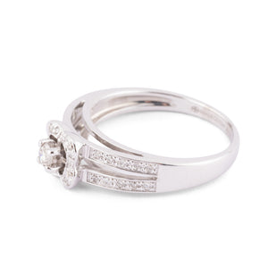 Bague or gris et diamant  de la maison Mauboussin