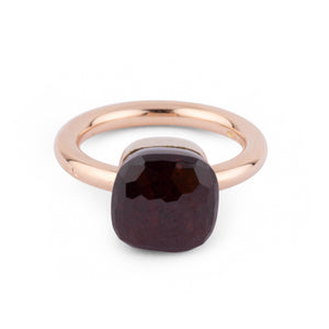 Bague Pomellato modèle Nudo en grenat