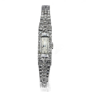 Montre en platine et diamants Art Deco - adalgyseboutique