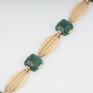 Bracelet en or jaune et malachite en pain de sucre
