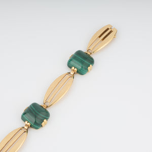 Bracelet en or jaune et malachite en pain de sucre