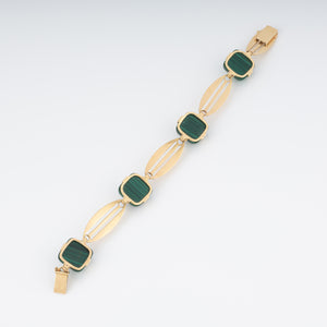 Bracelet en or jaune et malachite en pain de sucre