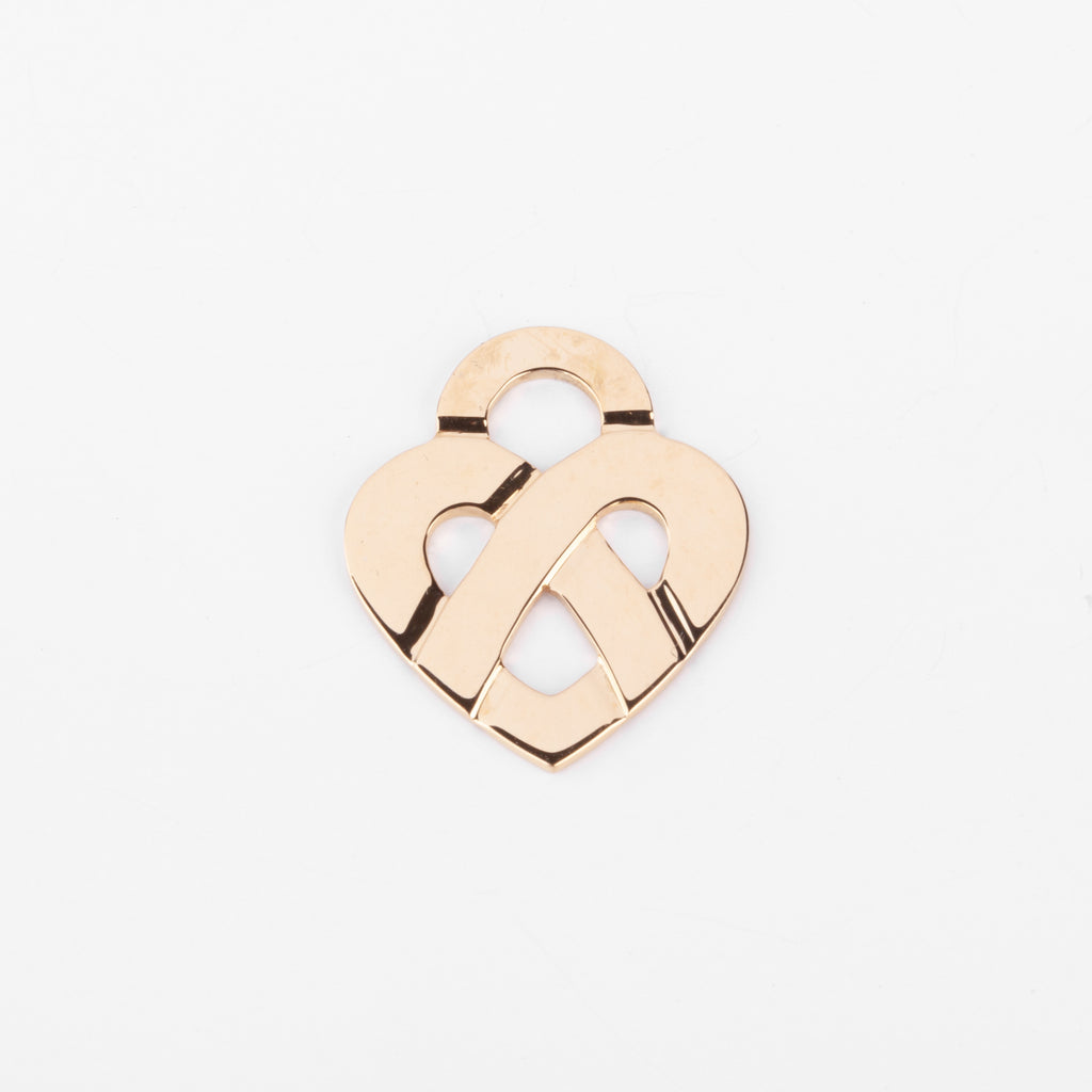 Pendentif en or jaune formant un cœur de la maison Poiray