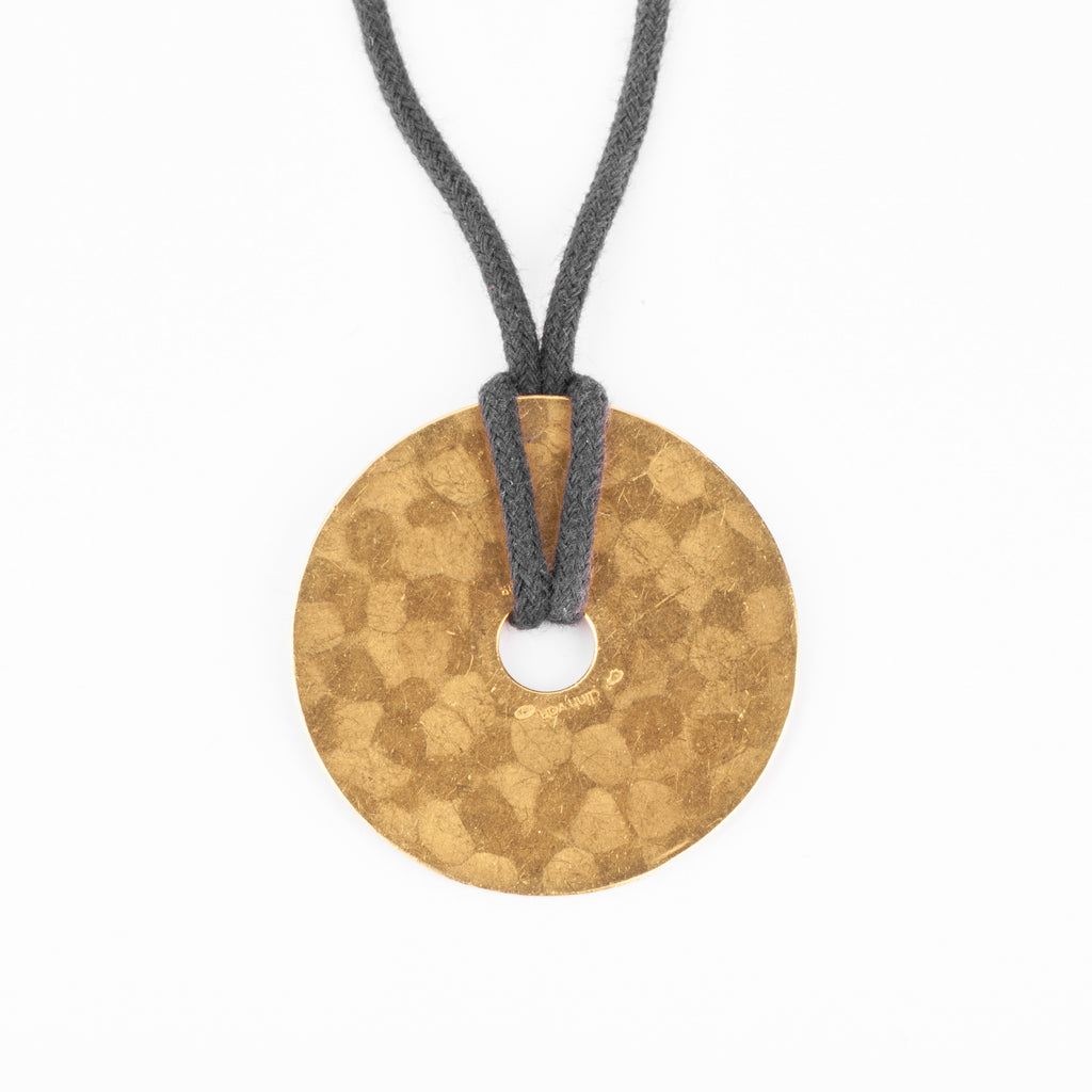 Pendentif martelée de la maison Dinh Van modèle cible