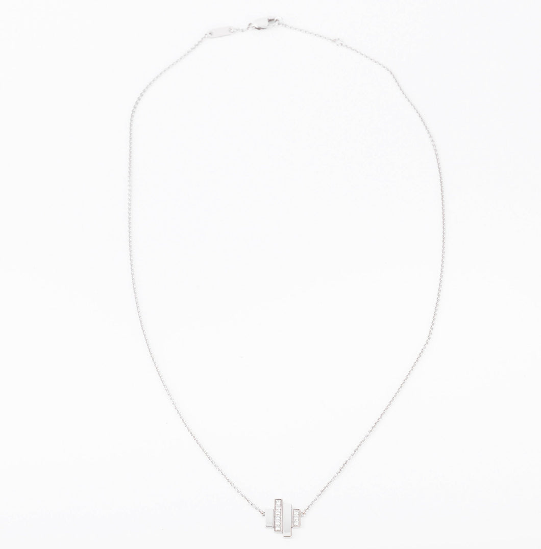Collier or gris et diamants de la maison Dinh Van
