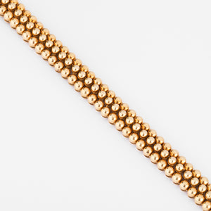 Bracelet or jaune 18k signé et numéroté de la maison Boucheron collection Grains de Raisin