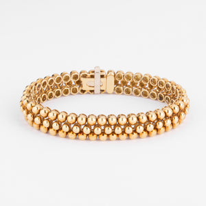 Bracelet or jaune 18k signé et numéroté de la maison Boucheron collection Grains de Raisin