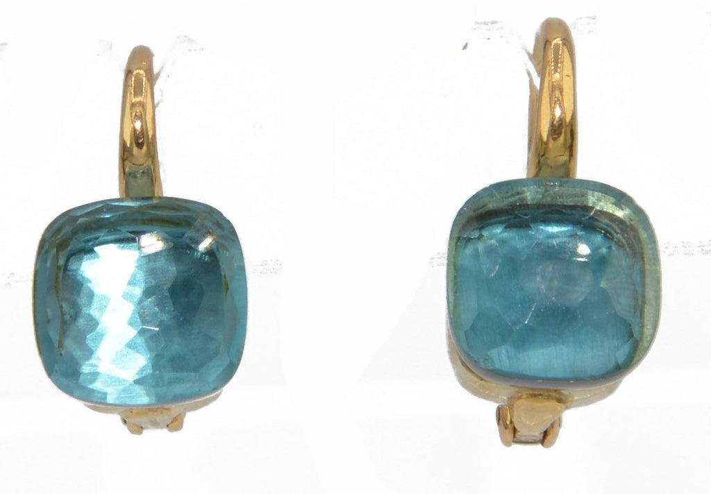 Paire de boucles d'oreilles de la maison Pomellato modéle Nudo en Topaze Bleue - adalgyseboutique