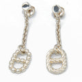 Paire de boucles d'oreilles signées Hermès en argent