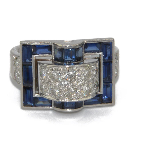 Bague en or gris et saphirs bleus calibrés