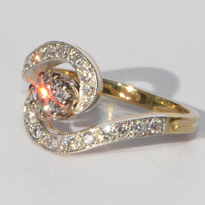 Bague tourbillon en or jaune et platine et diamants