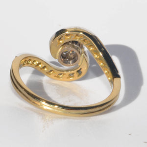 Bague tourbillon en or jaune et platine et diamants