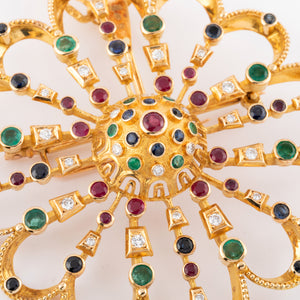 Pendentif et broche or jaune du créateur grec Lalaounis ornée de pierres précieuses