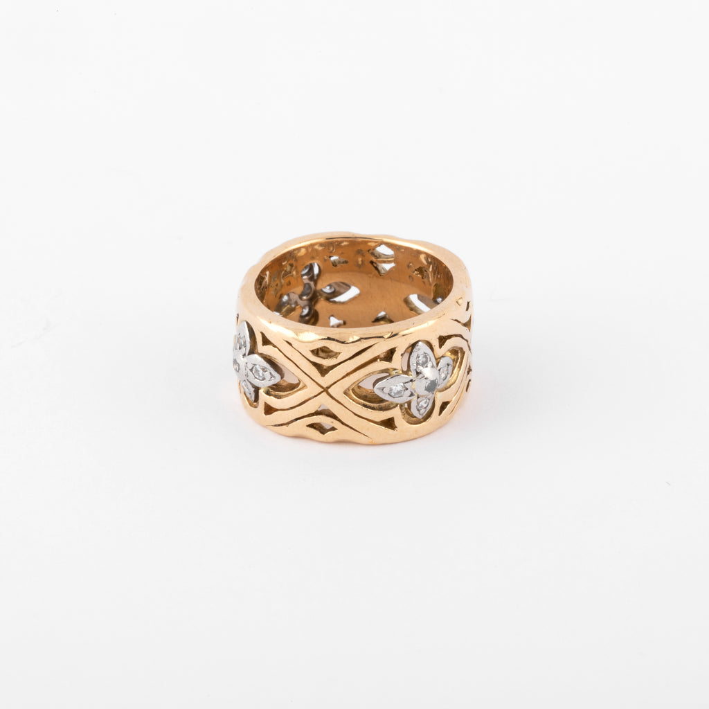Bague or jaune ciselé alterné de motifs fleurs