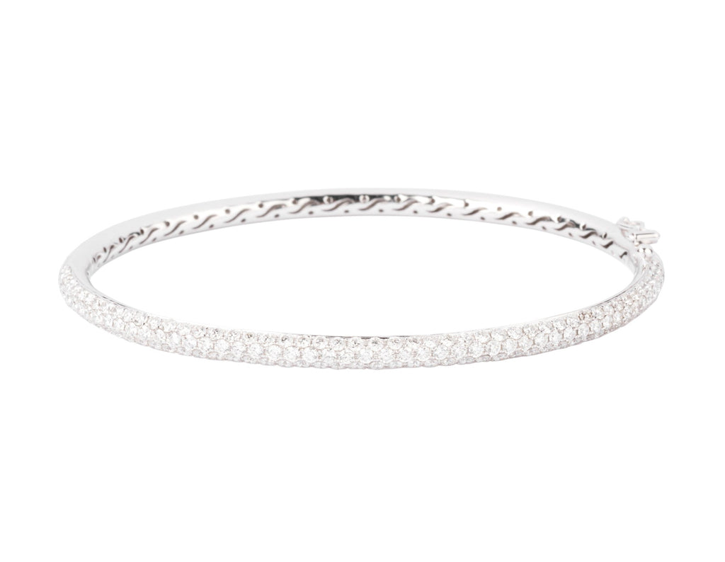 Bracelet jonc en or gris serti de 3 lignes de diamant