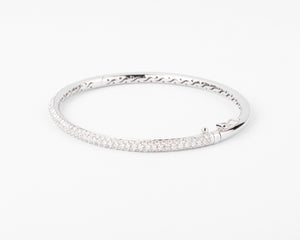 Bracelet jonc en or gris serti de 3 lignes de diamant