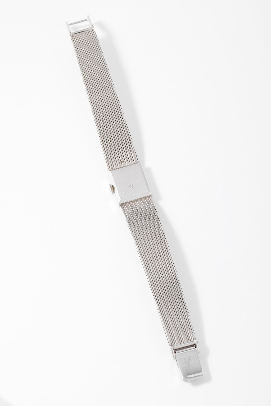Montre Tissot or gris et diamant datant des années 1960